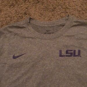 Gray Nike Tee shirt sleeve. Dri-fit, LSU logo and Nike sign #lsu #nike #women